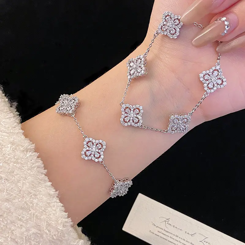 Four-leaf clover-shaped bracelet with full diamonds and silver enameled openwork micro-set zirconia stones, designed for women, exuding a sense of sophistication. velvet  ring rhinestone  car bracelet  business