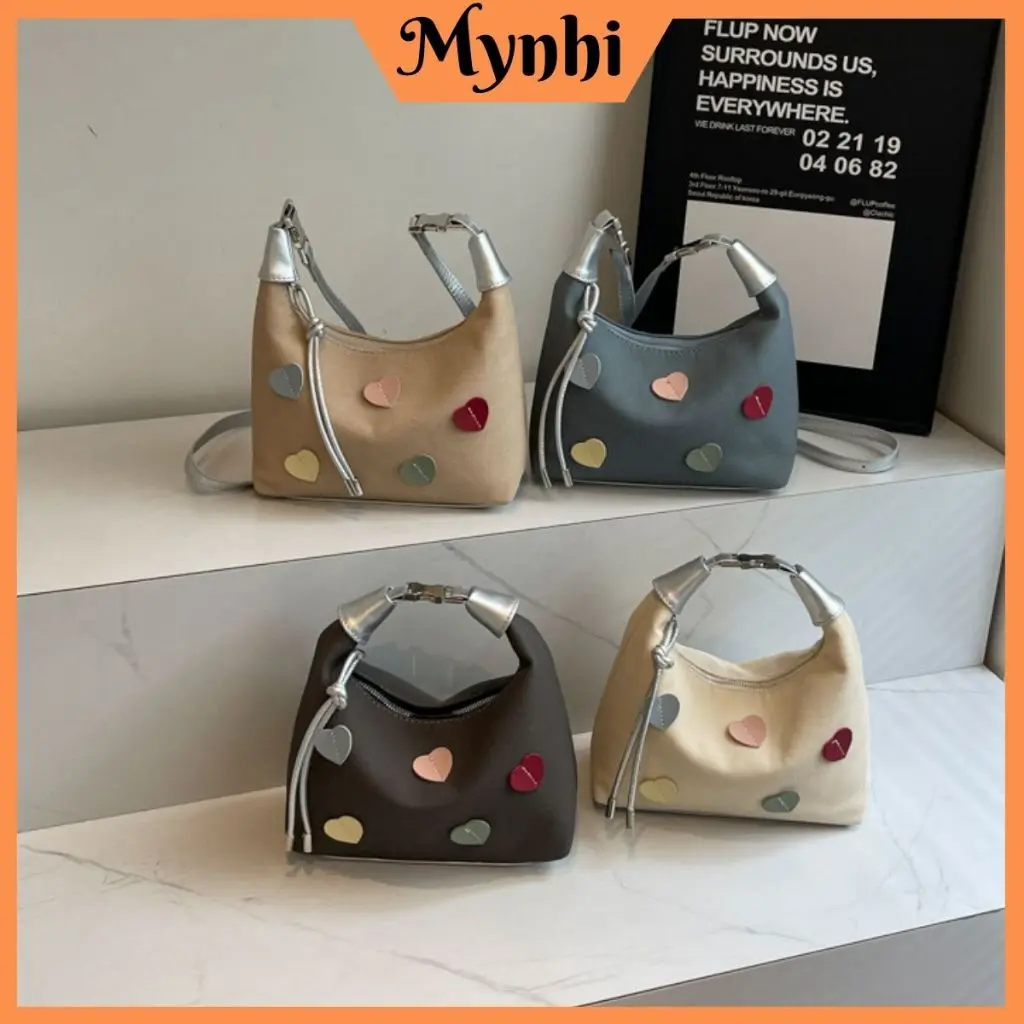 Túi xách nữ đeo chéo cầm tay da Pu kết hợp vải canvas đính tim mềm phù hợp mọi lứa tuổi SMN786