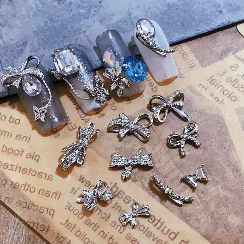 Cham nơ bạc -phụ kiện trang trí nail