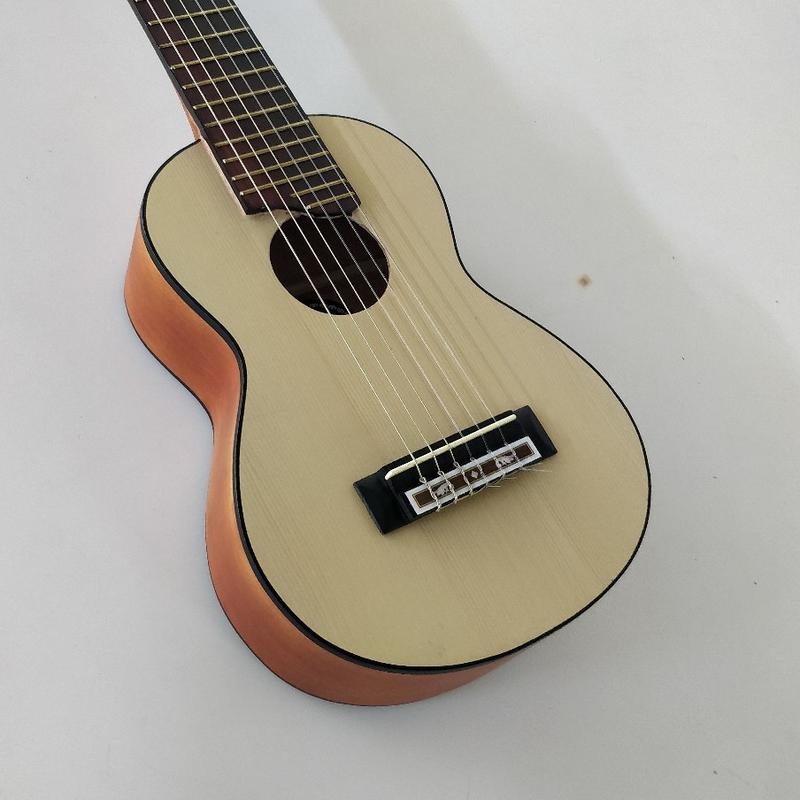 Product Introduction of Gitarlele Original Senar Nylon Gratis Packing Kayu Bonus Tas dan Pick 1