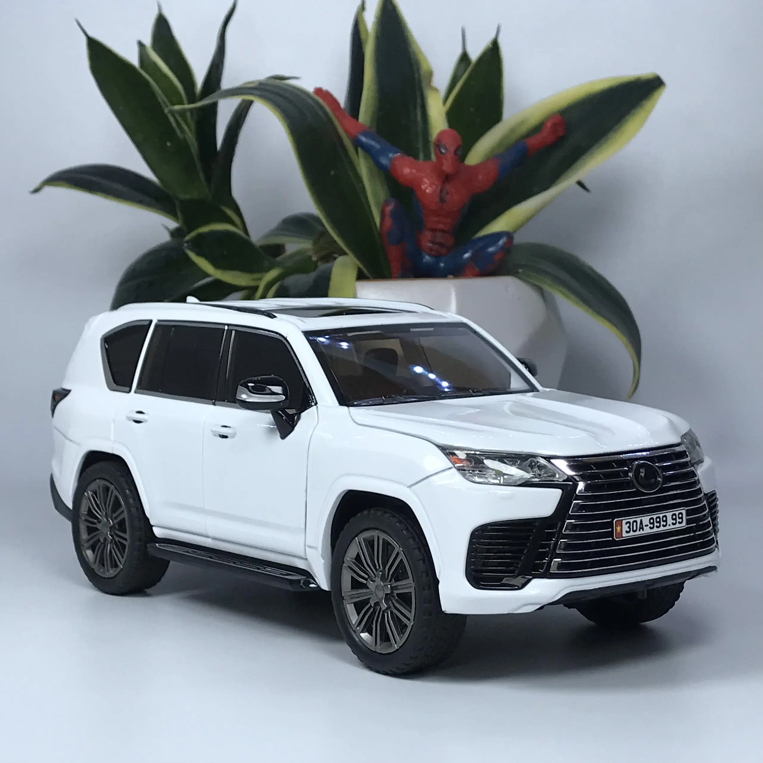 Mô hình xe Lếch xù LX600 tỷ lệ 1:24 bằng kìm loại mới ra mắt [Tặng biển số VIP] unisex đôi bạc ô tô mô hình & đồ chơi diecast