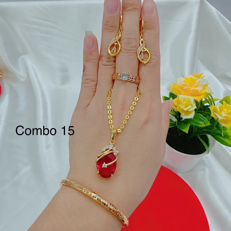 Bộ dây chuyền 4 món dây lắc nhẫn và bông tai( phụ nữ) Cao Su 6