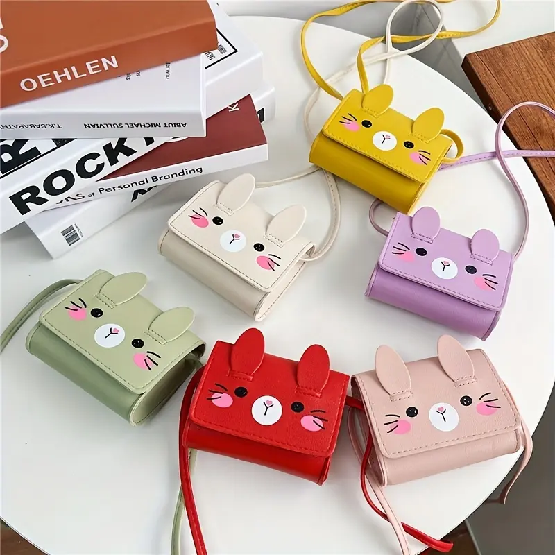 กระเป๋าสะพายข้างกระต่าย Kawaii สำหรับเด็ก ดีไซน์การ์ตูนน่ารัก กระเป๋าใส่เหรียญ กระเป๋าสะพายมินิ เหมาะสำหรับการเดินทาง โรงเรียน และใช้กลางแจ้ง