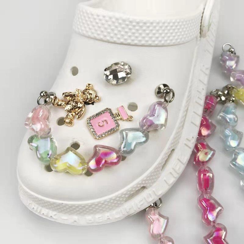 Product Introduction of Jibbitz Charms Shoes Decoration Accessories Shoes Light Color 13cm Pearl Chain Acrylic Star Chain Button for Hole Rubber Shoes 20
