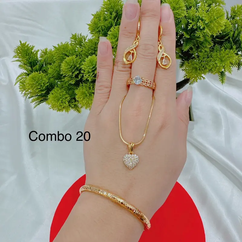 Bộ dây chuyền 4 món dây lắc nhẫn và bông tai( phụ nữ) Cao Su 5