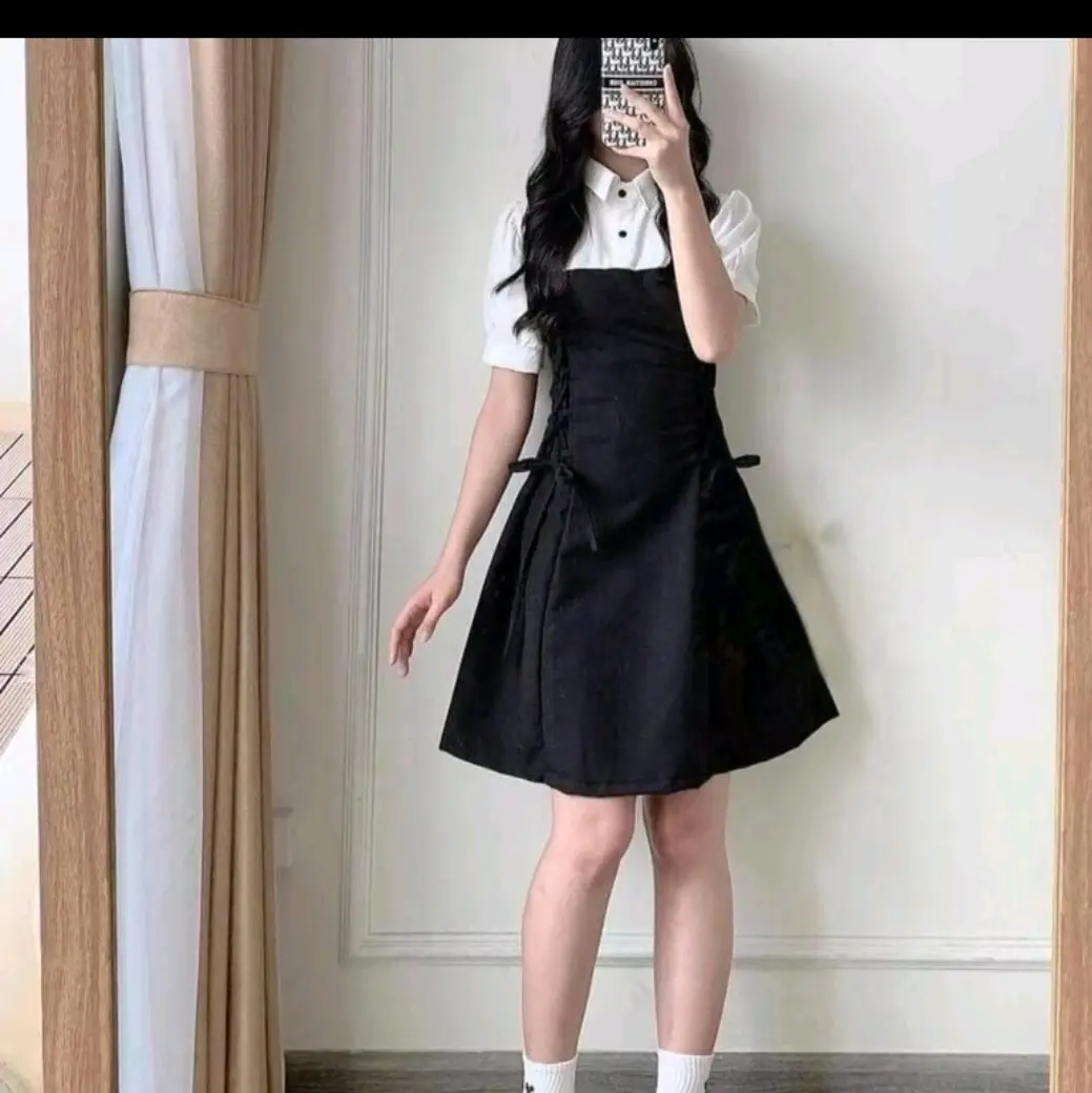 váy chữ A cổ sơ mi học sinh tay phồng,xếp ly kèm dây đan eo, màu đen trắng co giãn nhẹ .54kg trở về