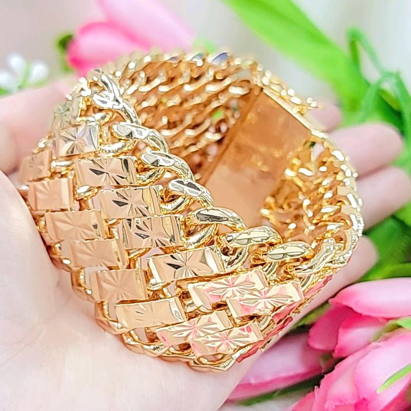 Lắc tay đồng đỏ 8 lượng chạm móc máy màu vàng Miền Tây 750 Phụ Kiện Đeo Tay
