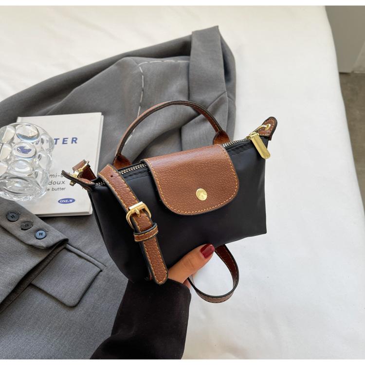 Product Introduction of Retro Explosions Handbag Shoulder Crossbody Bag Carrying High-grade Nylon Jiaozi Bag. 19