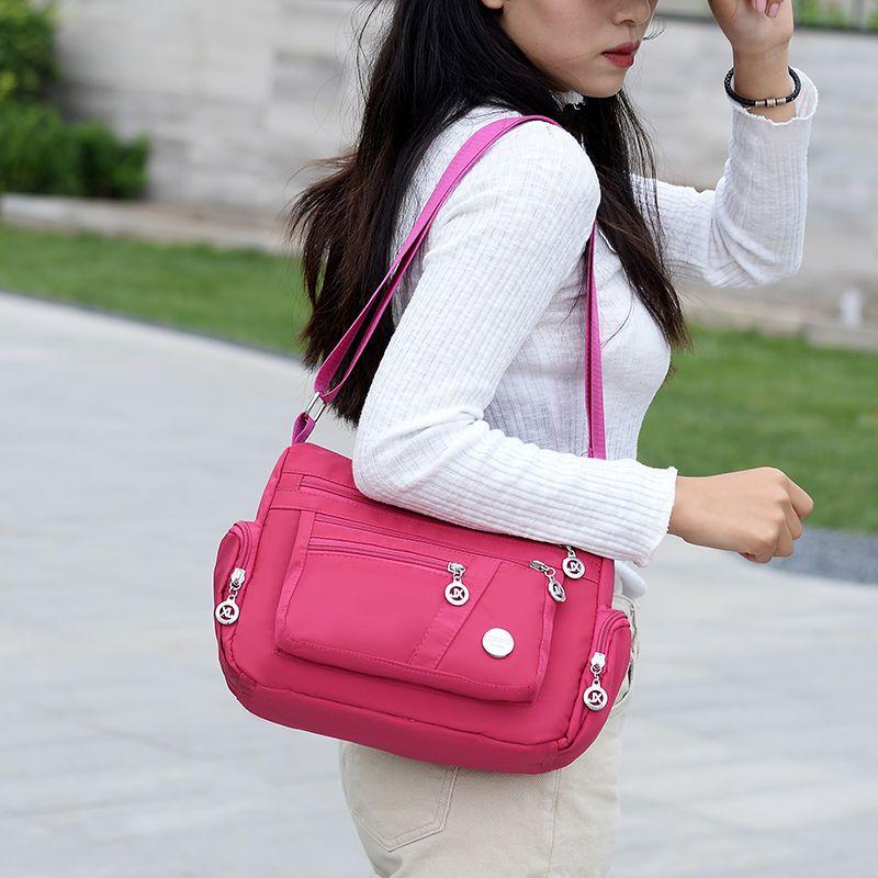 Product Introduction of Women's Bag Mother's Bag New 2025 Middle-Aged Women's Bag Nylon Canvas Bag Waterproof Multi-Layer Shoulder Messenger Bag 15