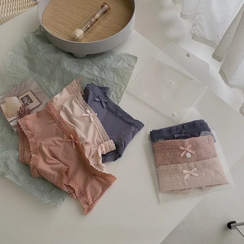 ￼Set Túi Ví 3 Quần Lót Nữ - Quần Lót Chất Đúc Su Phối Nơ Viền Ren Mát Lạnh 0