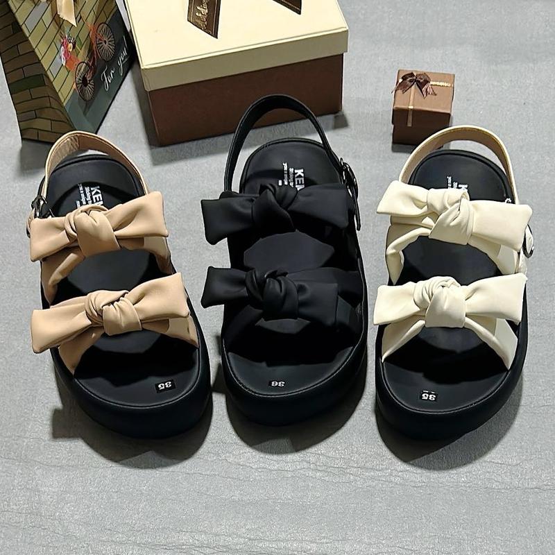 Sandal Nữ quai nơ cột đế cao 5cm da mềm êm nhẹ chân mũi tròn màu nâu/kem/đen 0