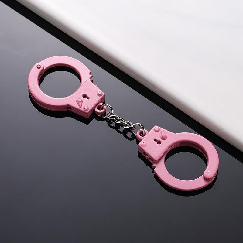 [ 15k People Collected] Small Pet Mini Cat Handcuffs Creative Metal Pendant Small Gift Double Handcuffs Toy Pink Stress Relief Powder 3