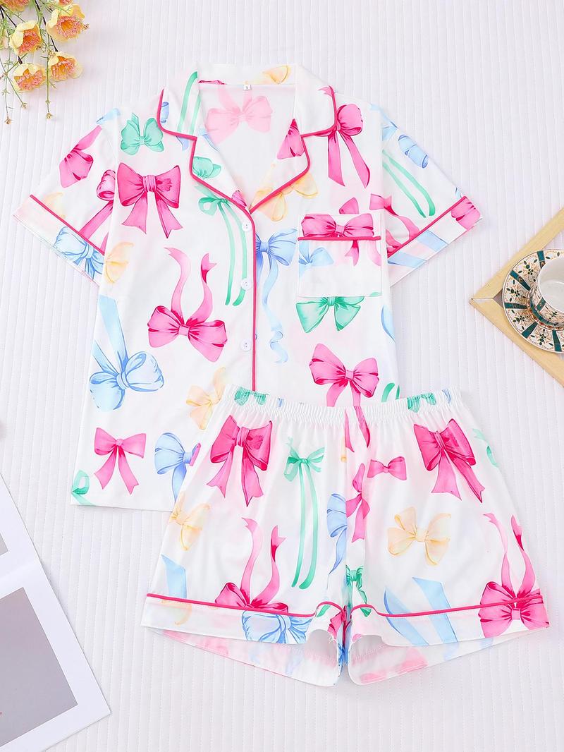 Product Introduction of Women's All Over Bow Print Short Sleeve Lapel Neck Shirt & Bow Decor Elastic Waist Shorts Pajama Two-Piece Set, Casual Comfy Button Front Chest Pocket Design Top & Ruffle Hem Shorts PJ Set, Ladies Sleepwear for Summer 3