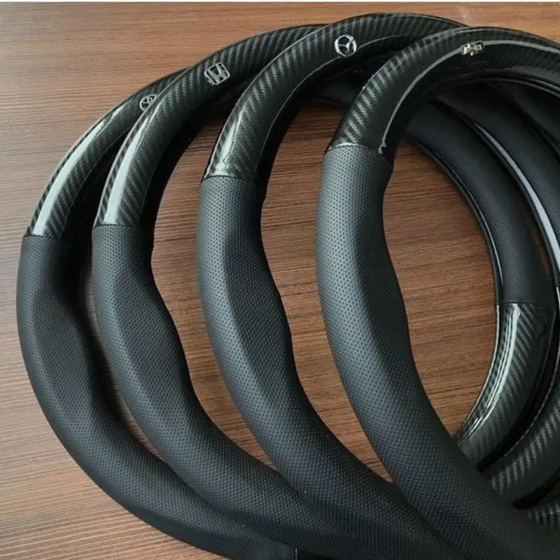 Bọc vô lăng CARBON phối da thoáng khí đủ các hãng xe Toyota-Honda-Hyundai-Mazda-KiA-Ford-Mitshubishi-Chevrolet cao cấp Cacbon 5