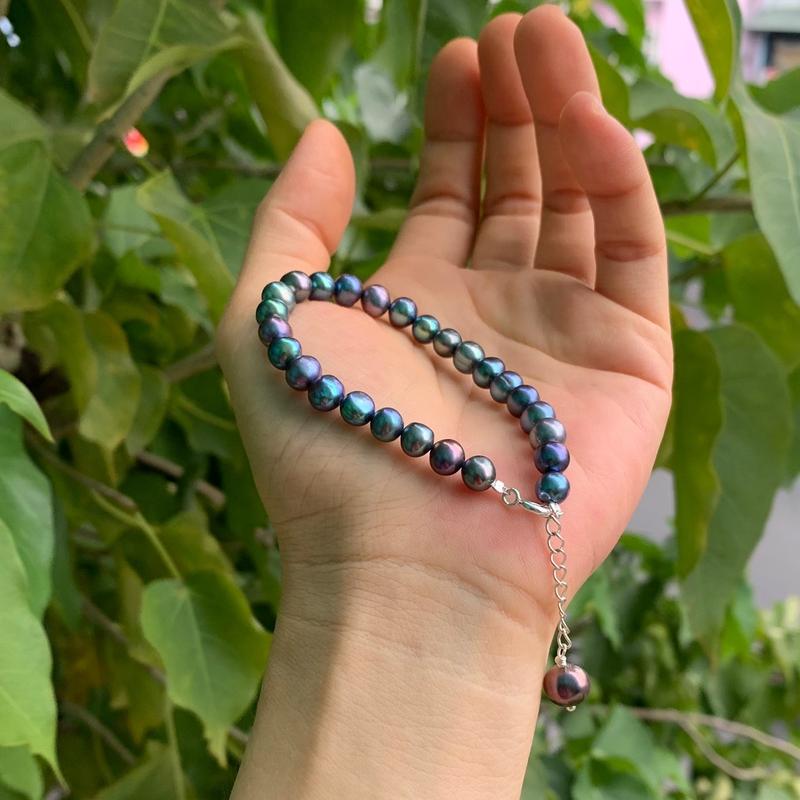 Vòng tay ngọc trai 6-6,5ly gần tròn đều hạt bóng đẹp ít tỳ vết tự nhiên khoá bạc 925 có tăng đưa xinh xắn