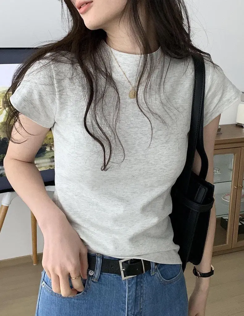 JJ พร้อมส่งจากกทม เสื้อยืดสวยๆผู้หญิง เสื้อยืดรัดรูป เสื้อยืดสีขาวผู้หญิง เสื้อยืดผญสวยๆคอกลมสไตล์อเมริกันเสื้อยืดวินเทจ ผู้หญิง สีขาวเสื้อยืดแฟชั่น