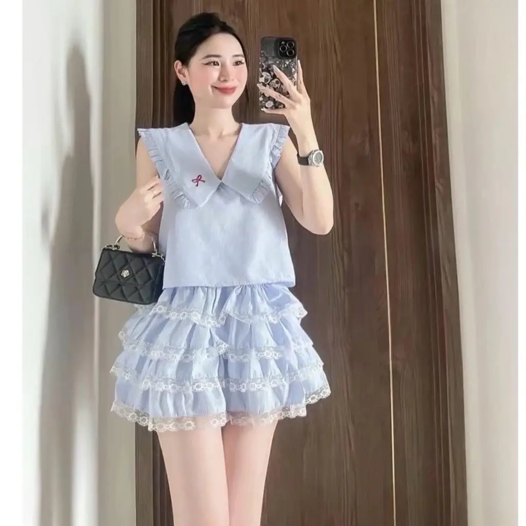 Set áo nơ thêu khoá kéo mix chân váy xếp tầng bồng hot hit