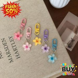 จี้พวงกุญแจซากุระ พร้อมสต็อก ปี 2025 เครื่องประดับขนาดเล็ก ถุงดอกไม้ ของขวัญ ล็อกเกตหลากสี ทันสมัย มีสไตล์ กุญแจ ดอกไม้ พวงกุญแจ