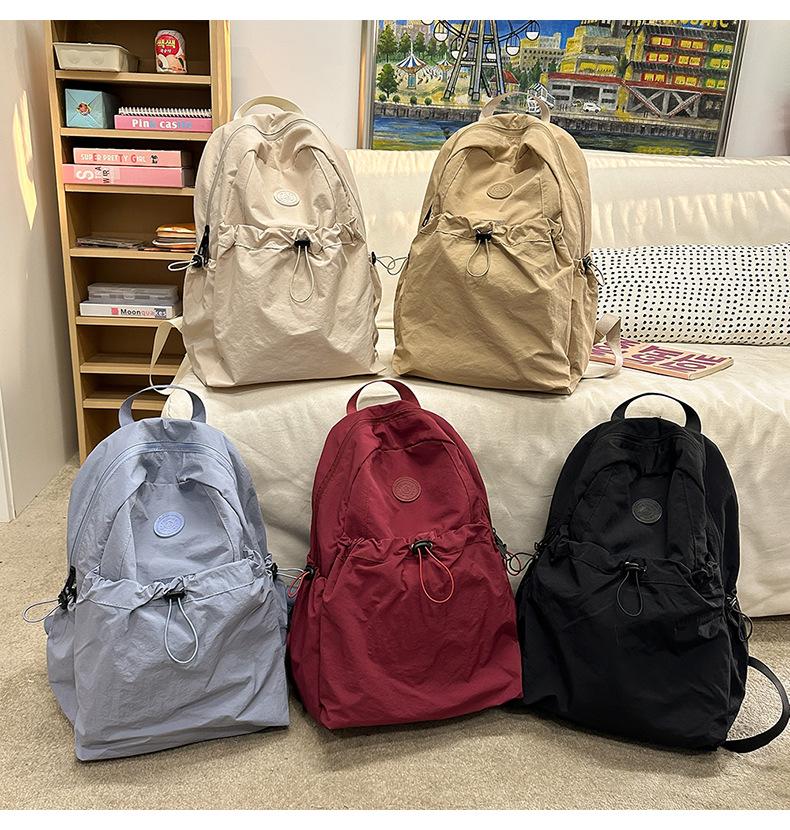 Product Introduction of Backpack, Student Schoolbag, Outdoor Backpack Leisure Simple and Lightweight Early High School Student Schoolbag New Drawstring All-Match Travel Backpack 11