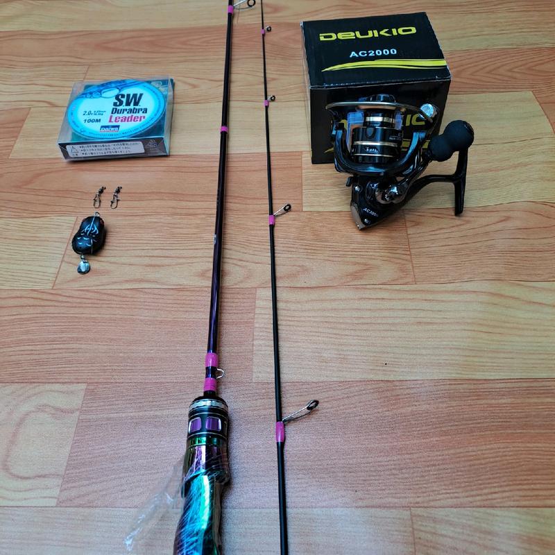 bộ cần câu ul titan ánh tím kèm máy ac 2000 dù sw và nhái supoer