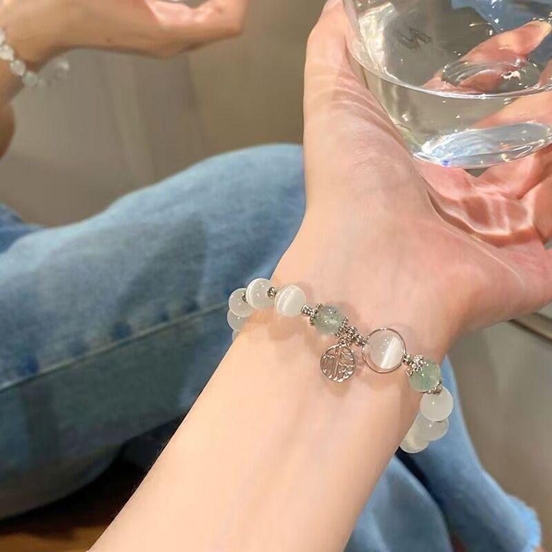 Product Introduction of TikTok Anti-Cat's Eye Crystal Women's Niche Design Bracelet DIY Stone Sunlight Gold Sand High-Quality Exquisite Fortune Pendant 2
