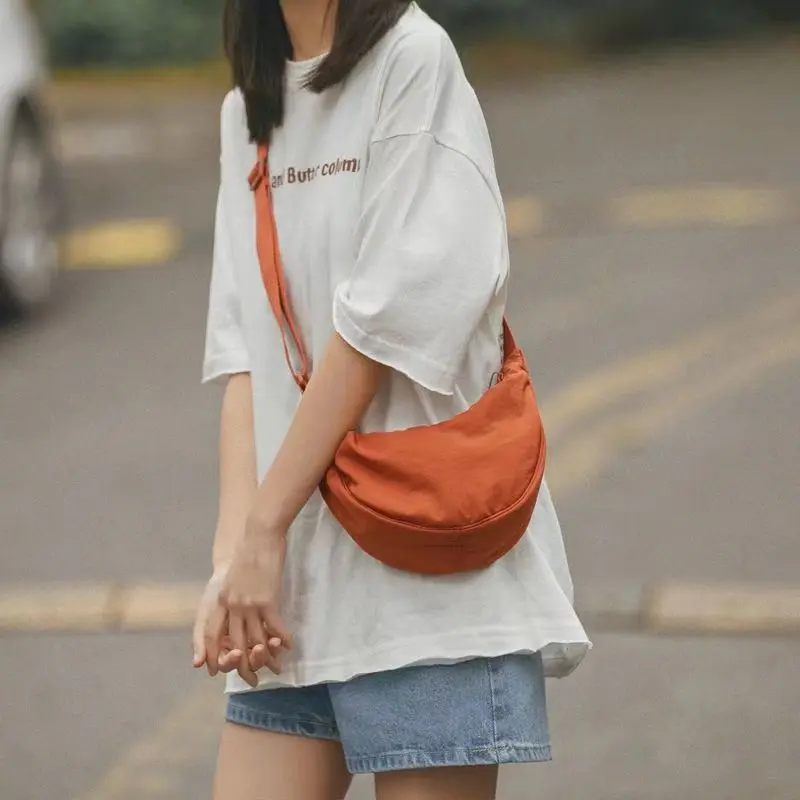 [In stock] New beginning new shoulder bag good quality nylon shoulder bag men women's messenger bag fitting same style cloth shoulder bag new students nylon dumplings bag women's shoulder bag all small bags