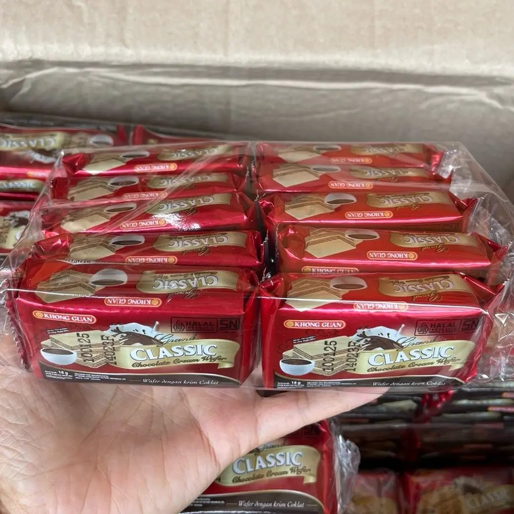 Agen distributor makanan ringan snack cemilan biskuit wafer khong guan grand classic chocolate cream renceng pack murah