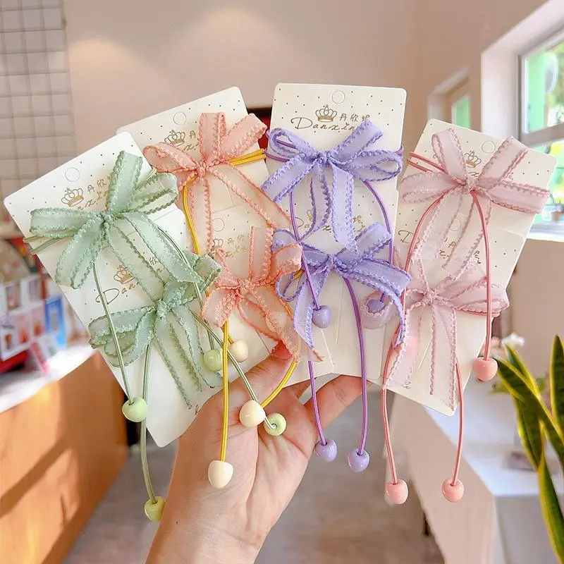 01 Dây cột tóc đính nơ dễ thương cho bé gái