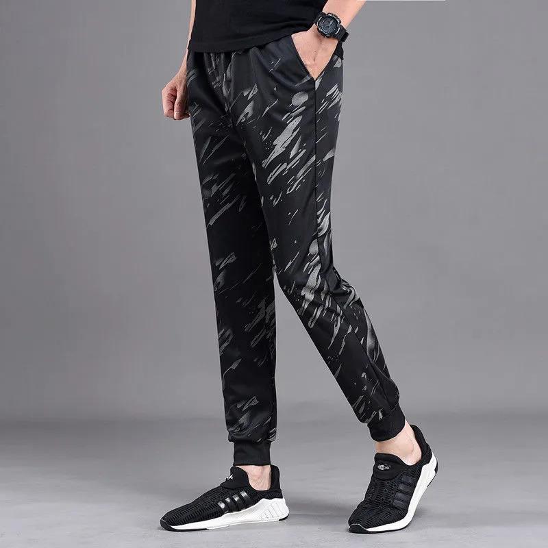 Product Introduction of Autumn Trousers Men Stretch Camouflage Pant Casual Leg Fitting Sweatpants Loose Wear-resistant Trousers 7