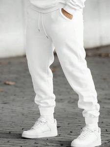 Pantalones deportivos para hombre de color sólido con cintura con cordón, pantalones jogger casuales de corte regular con bolsillos para otoño e invierno, pantalones para uso diario