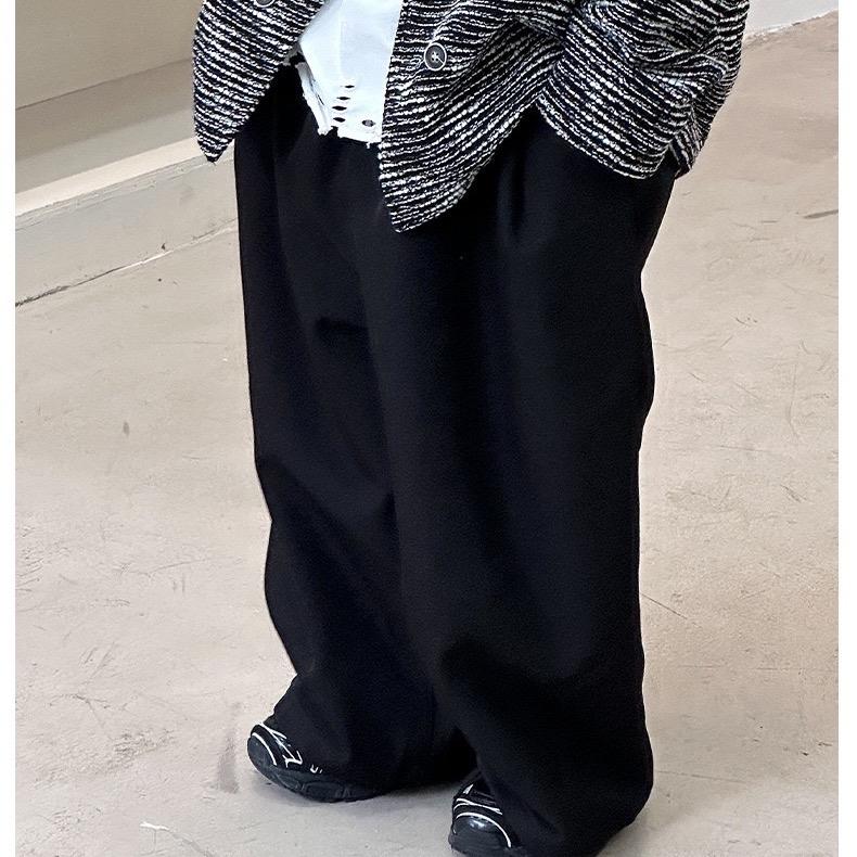 Quần vải thun ống rộng có dây rút gấu quần