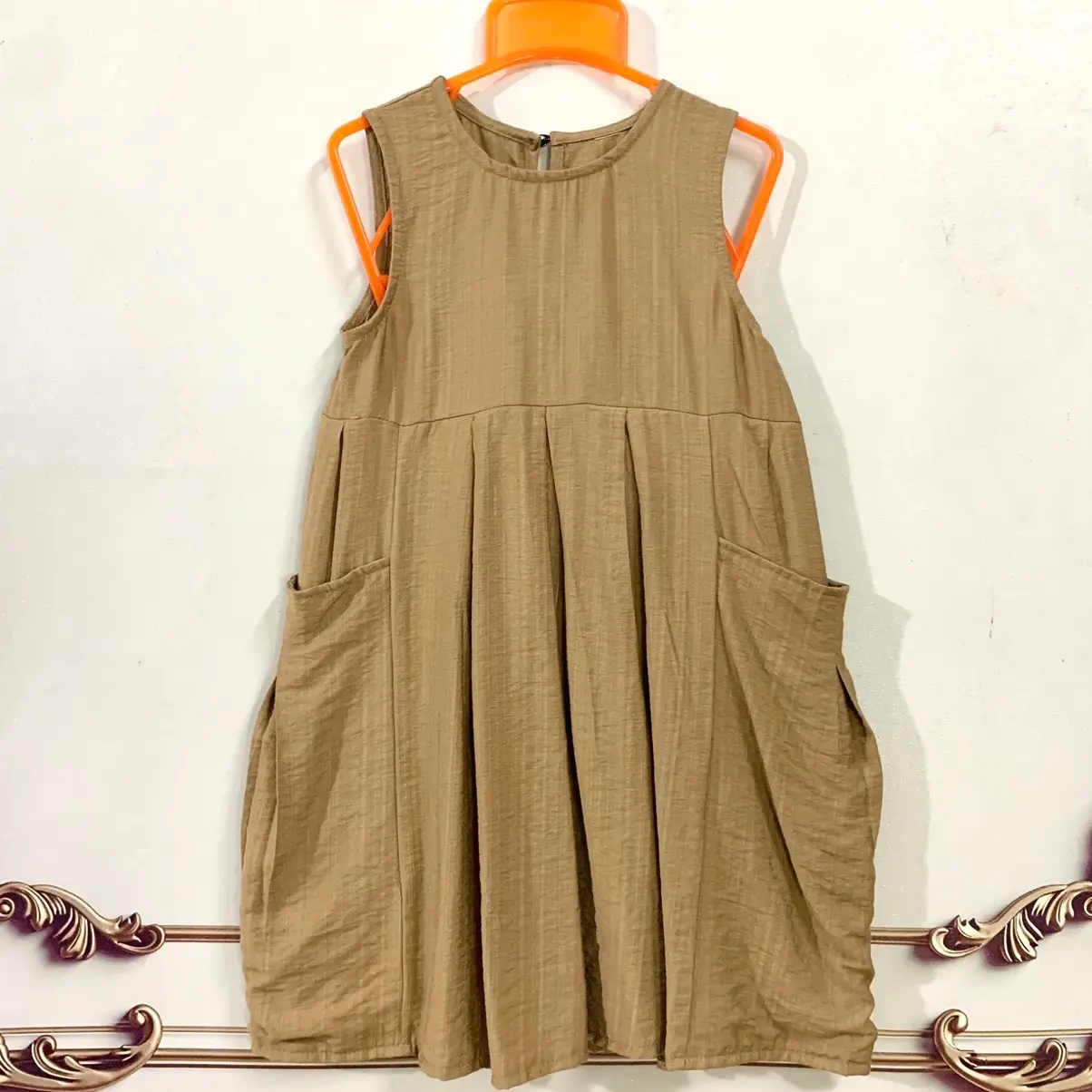 Váy bé gái 12-35kg chất đũi có hai túi to hai bên ,váy có hai màu Hồng và nâu