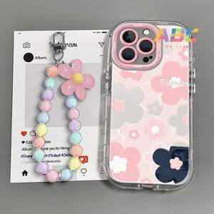 Case untuk iPhone 13 11 15 pro max 15 14 plus xs XR 11 12 13 14 pro 14 Plus 7+ 8+ Xs Max Casing ponsel anti jatuh bunga kecil berwarna merah muda yang modis dengan gelang Z02430