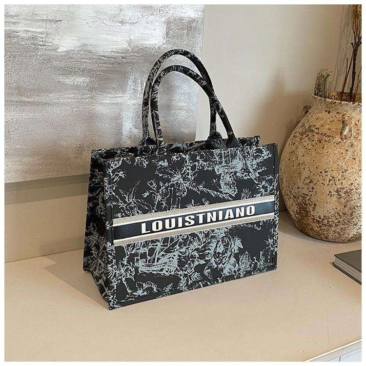 Product Introduction of Trendy Large Capacity Tote Bag for Women 2025 New Fashion Canvas Shoulder Handbag Tote Bag Niche Handbag Wholesale 13