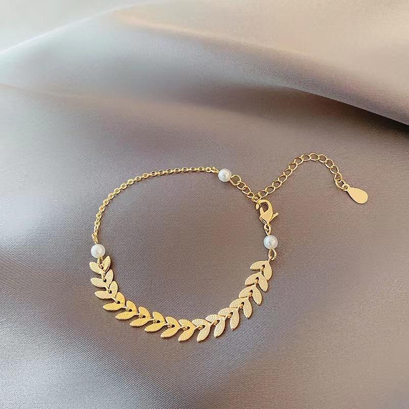 Product Introduction of Three Piece Set of Niche Design, Wheat Ear Pearl Necklace, Earrings, Bracelet Necklace, Light Luxury High-end Hot Selling Jewelry Set 1