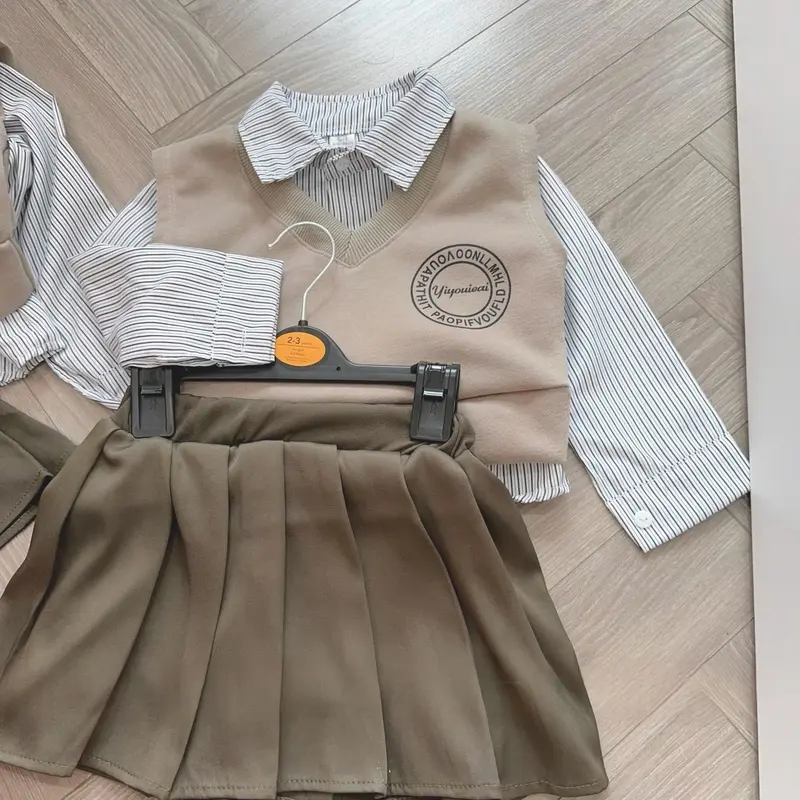 (10-30kg) set áo thun số phủ bóng và chân váy xếp ly bé gái 6