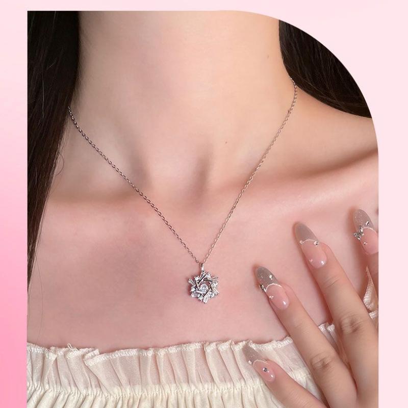 Product Introduction of Silver Titanium Steel Cross Chain Necklace with Winter Beating Heart Snowflake Pendant for Women Sweet Light Luxury Clavicle Chain 10