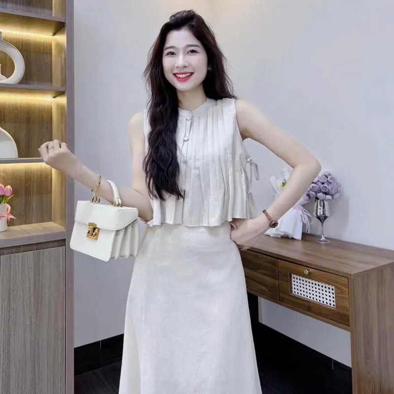 L940- Sét váy nữ, sét váy xếp ly, áo form xòe sát nách nút bọc xếp ly, chân váy trơn dáng dài (40-62kg) Women Voi 3