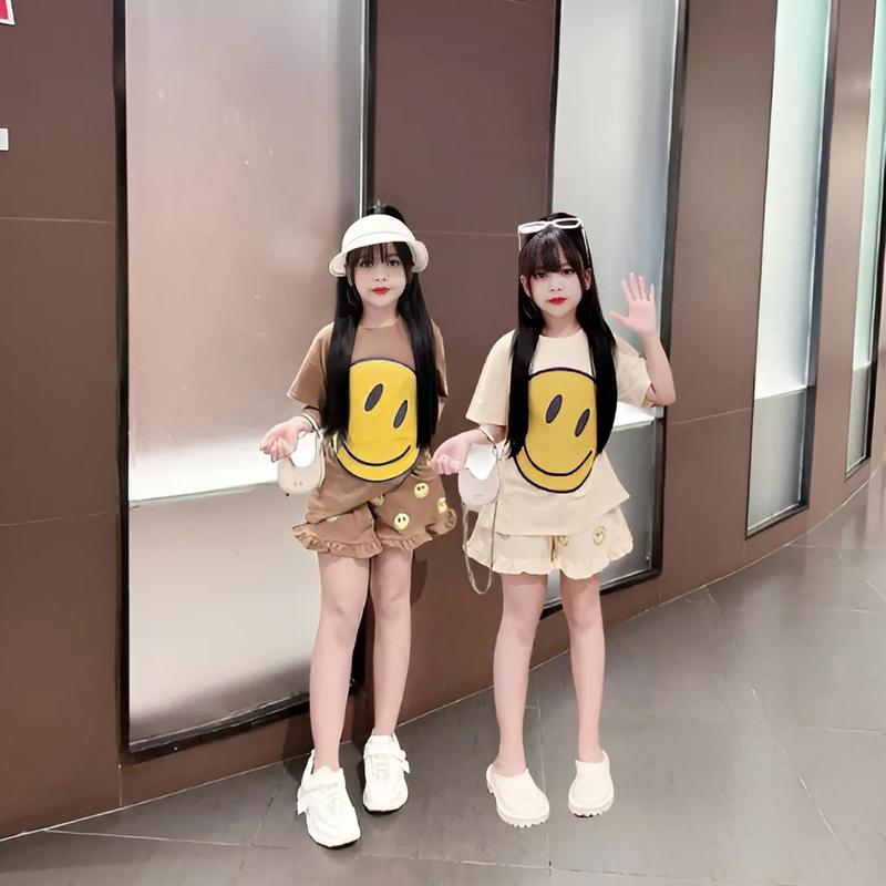 4-14 TUỔI Bộ quần áo bé gái áo cộc tay in hình mặt cười dễ thương chất vải cotton mềm mịn.M19 2