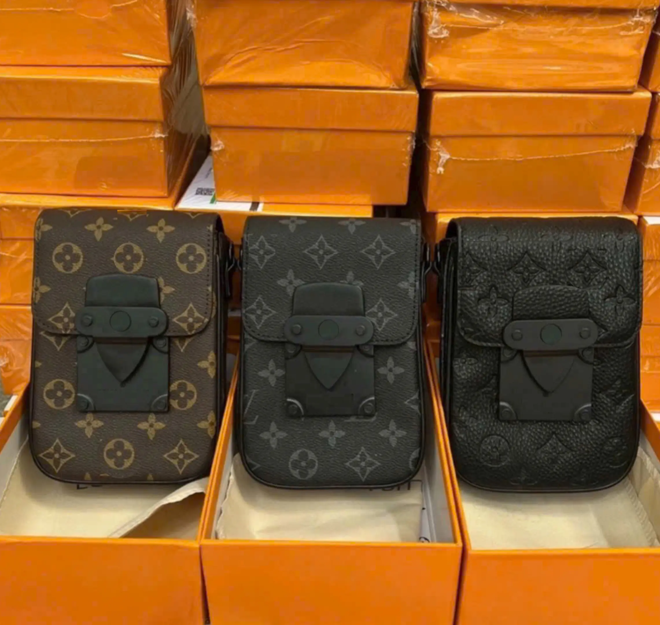 Túi đeo chéo mini đựng điện thoại da cao cấp dáng đứng. 2 ngăn. nắp hút nâm châm.(Full box nguyên seal) Size 18cmx12cm