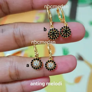 Anting melodi titanium lapis emas