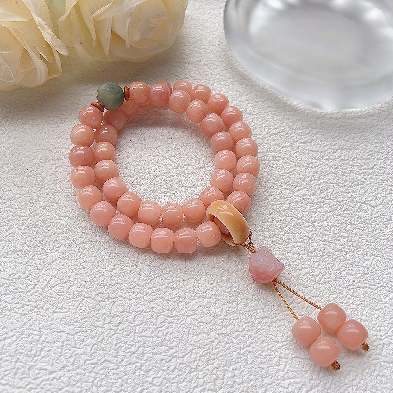Product Introduction of Pink white jade bodhi root bracelet Female circular finger soft play bodhi Buddha beads student disk play gradient bracelet 19