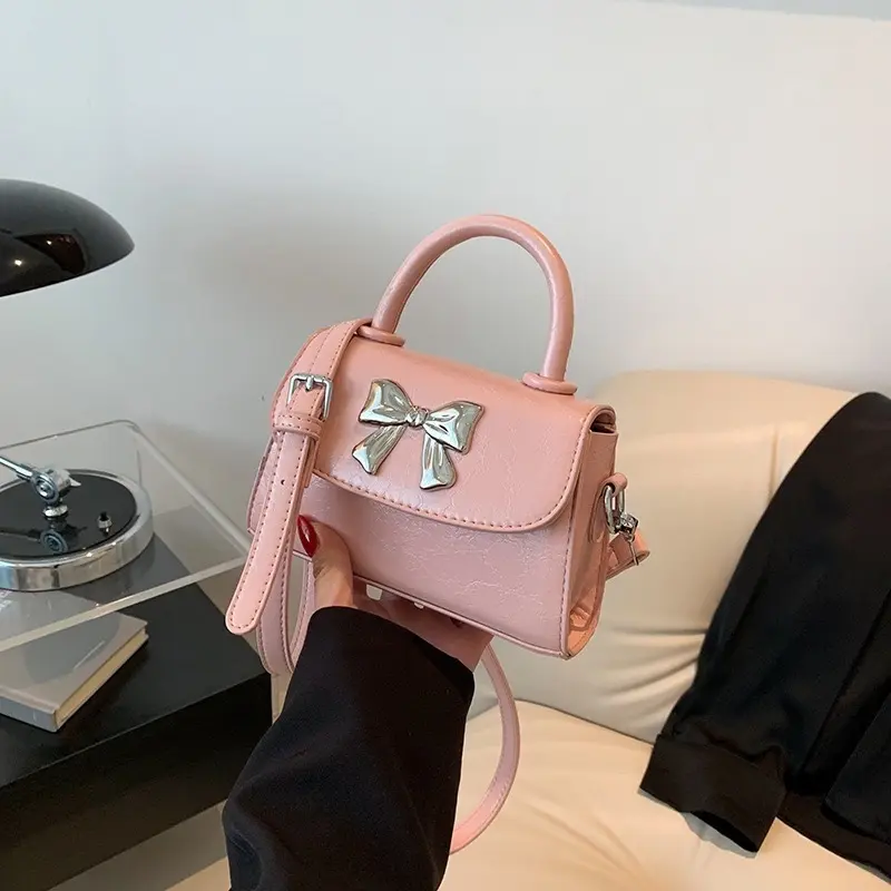 Túi xách nữ cầm tay đeo chéo da trơn Đính Nơ Bạc xinh xắn Bag 7