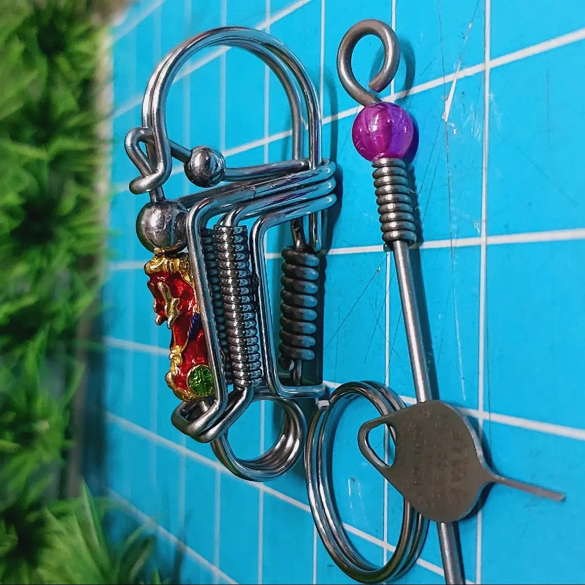 móc khóa inox phối tuỳ hưu ngậm ngọc.