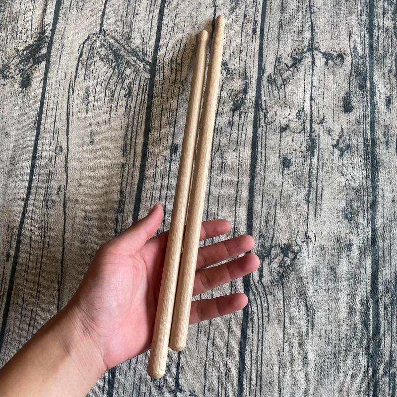 Dùi trống đội con gỗ đẹp có đầu nhọn