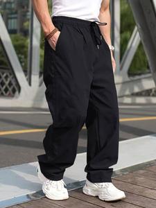 Pantalones cargo para hombre de color sólido con bolsillo y cintura con cordón, corte regular, moda casual para uso diario, pantalones para hombre para todas las estaciones