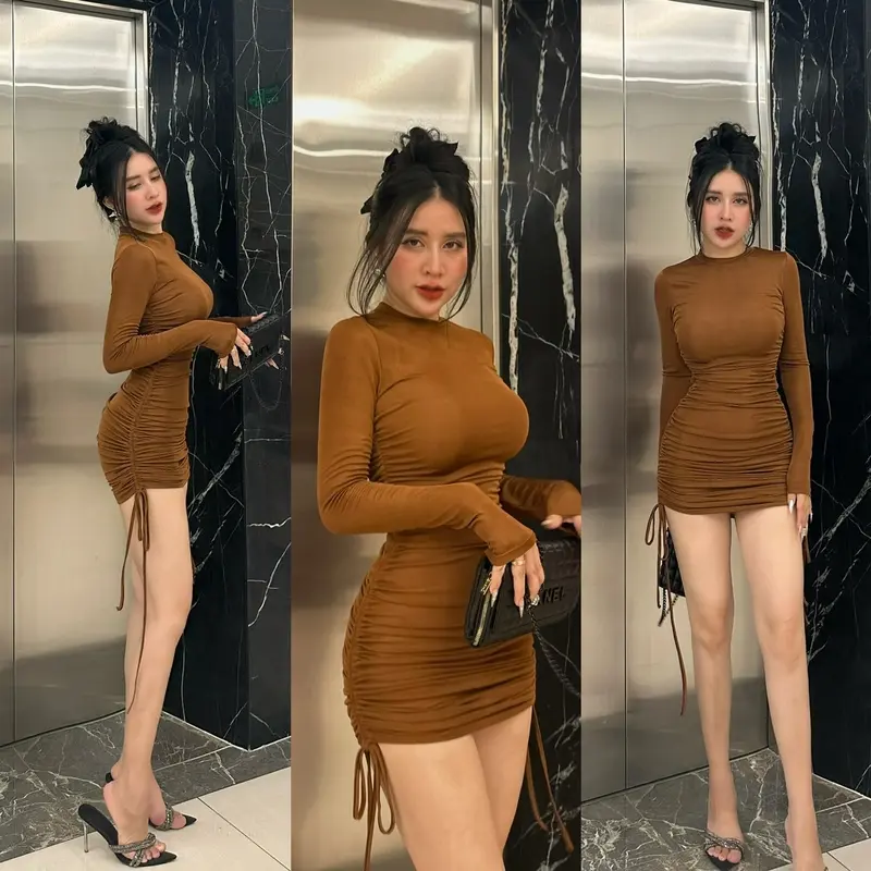 Đầm body nữ tay dài nhún tôn dáng, vải thun nhũ kim cương cao cấp co dãn lên dáng rất đẹp luôn ạ. Có thể điều chỉnh độ ngắn dài khi rút dây. Mặc đi làm, đi chơi, đi tiệc đều xinh luôn ạ. Bảng màu gồm : xanh bơ, xám, hồng ,đen ,cam ,nâu. Nhung Dress Voi 5