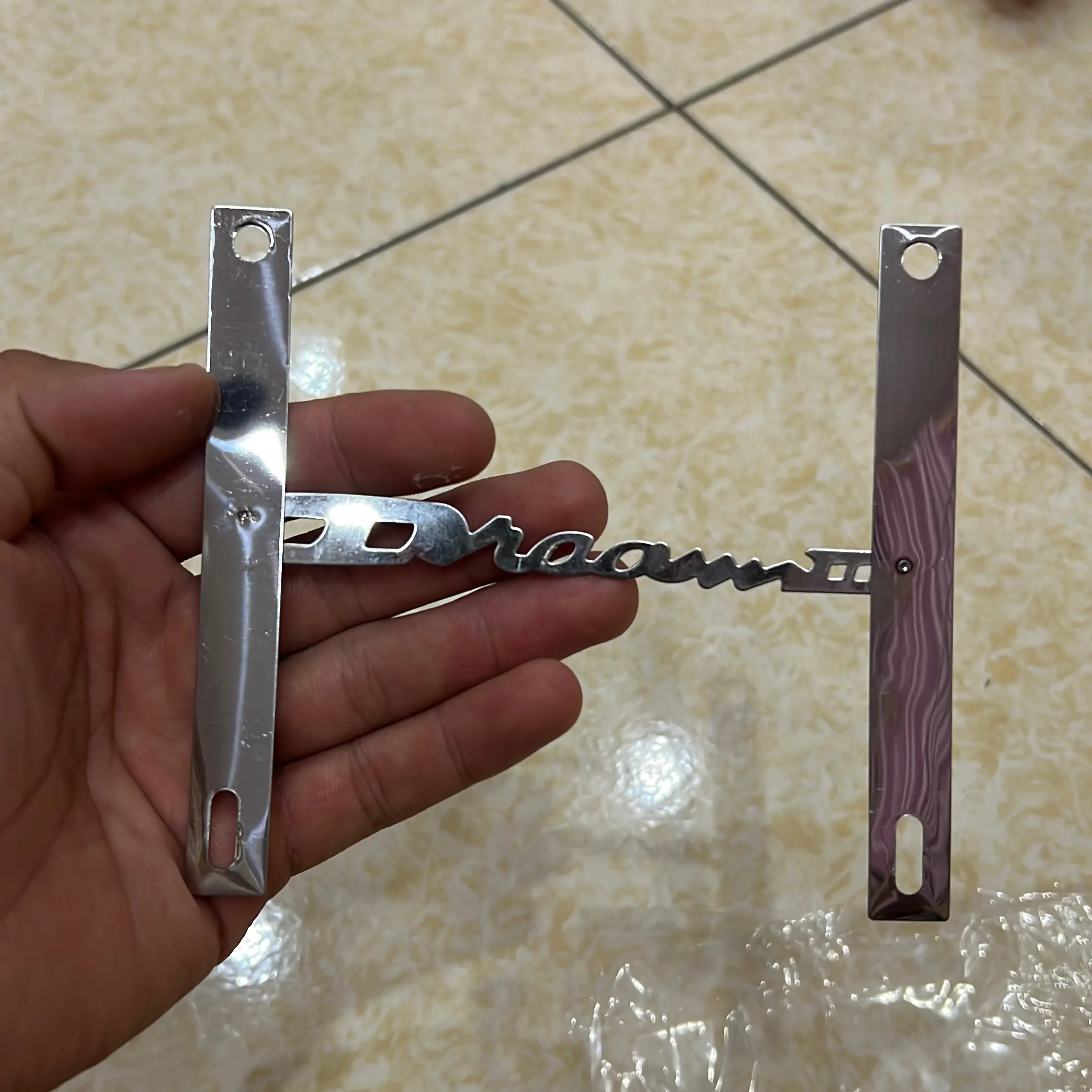 Chữ dream inox gắn vào casu tay xách