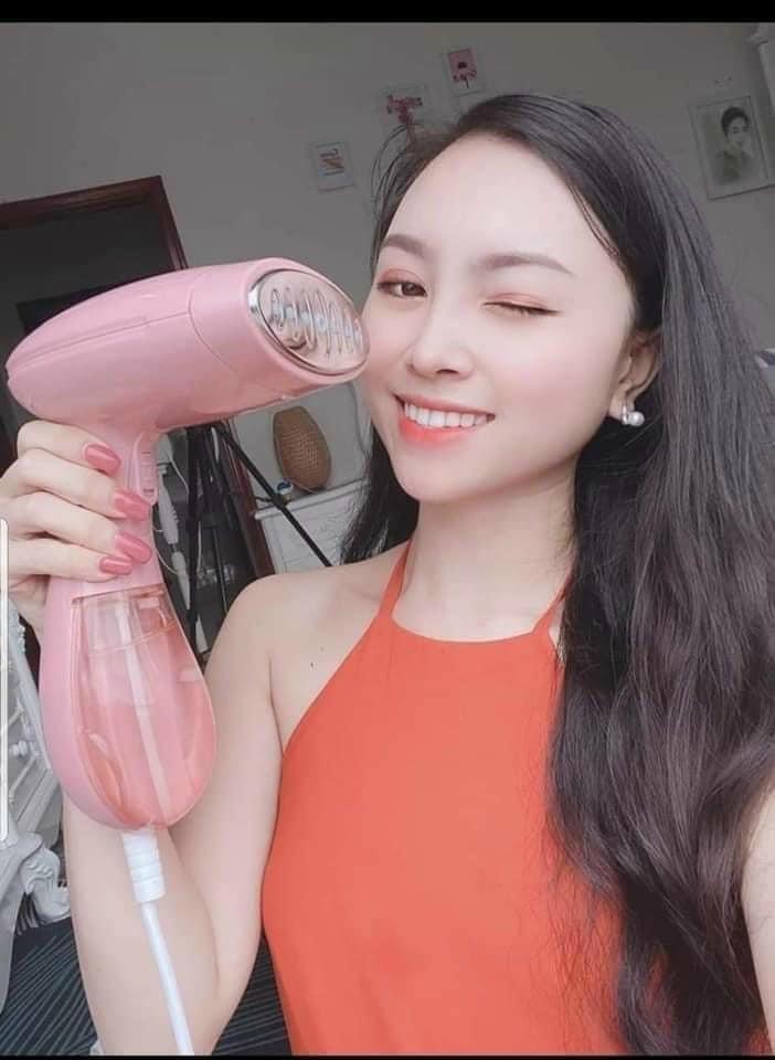 Product Introduction of Bàn ủi hơi nước cầm tay màu hồng - bình nước có thể tháo rời - Bàn Ủi Du Lịch Ủi Quần Áo 1
