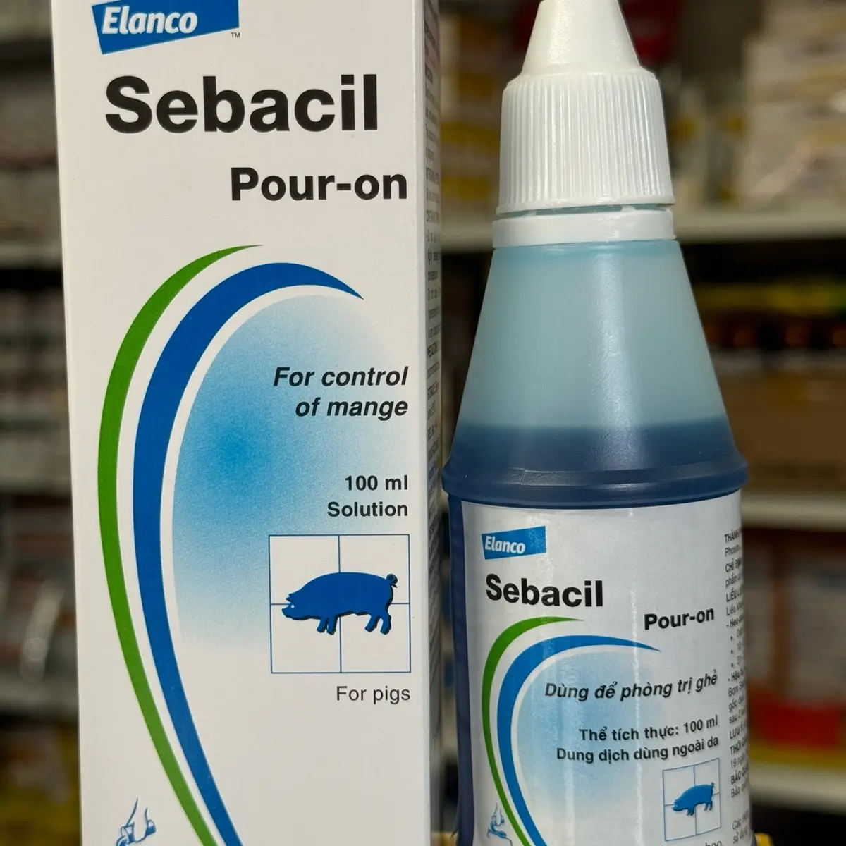 Sebacil. Chai 100ml thảo dược có màu xanh làm cho vật nuôi ko còn ve, rận, ghẻ, bọ chét